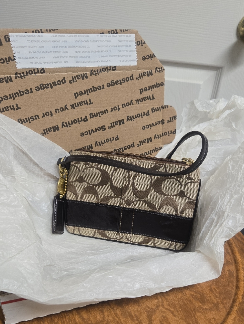 Coach Signature Canvas Wristlet in Brown/Tan